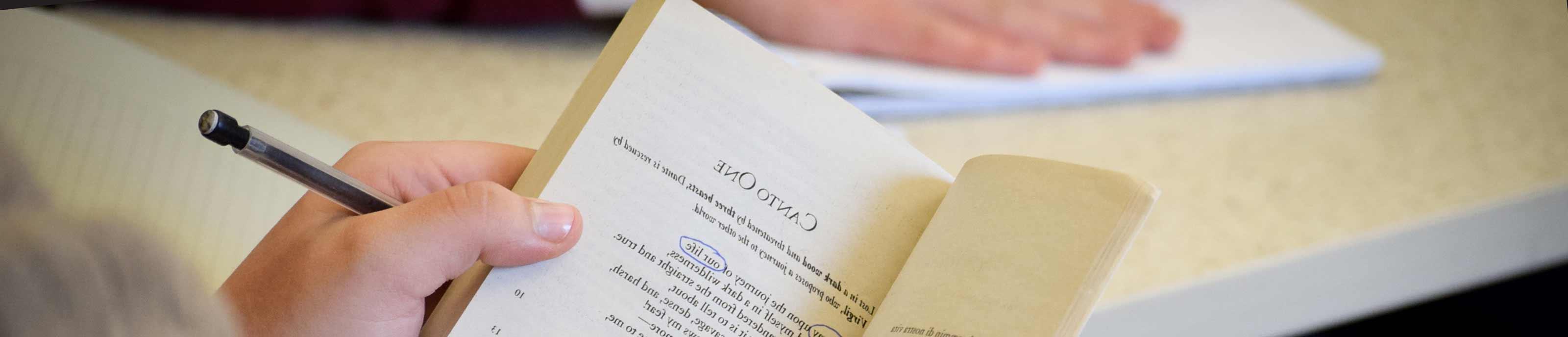 Student holding a book